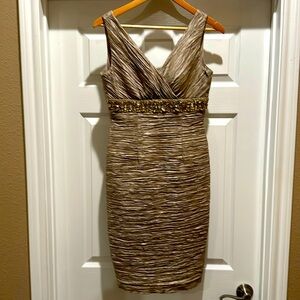 Women’s size 4 evening or cocktail dress. Knee length.